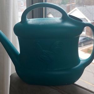 Plastic watering can